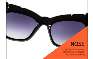 Detalle de gafas de sol cat-eye para mujer, montura grande negra con lentes degradadas.
