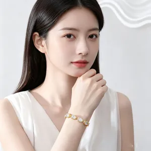 Close-up detail of the elegant water drop zirconia bracelet worn gracefully on wrist.