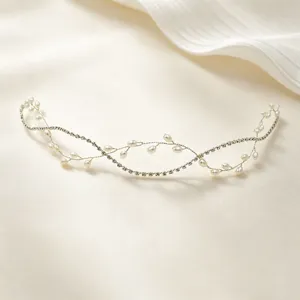 Elegant bridal pearl and rhinestone hair vine, handmade wedding hair accessory for women.