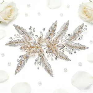 Handmade bridal hair vine with pearls and crystals, perfect wedding hair accessory for brides.