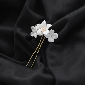 Épingle à cheveux de mariée en céramique faite à la main, accessoire élégant pour mariage.