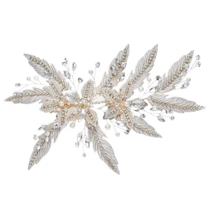 Elegant bridal hair accessory with artificial pearls and crystal rhinestones for wedding.