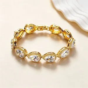 Exquisite pear-shaped zirconia gold-plated bracelet detail, elegant women jewelry daily wear.