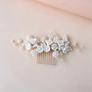 Handmade pearl hair comb bridal floral wedding hair accessory exquisite detail view.