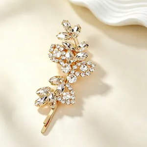 Gold rhinestone hair clip for women, exquisite floral bobby pin bridal wedding hair accessory.
