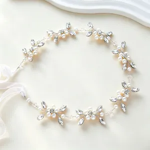 Bridal pearl rhinestone hair vine detail, elegant floral headband close-up for wedding.