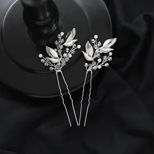 Silver bridal hair pins detail, handmade crystal pearls leaf hair fork wedding accessories closeup