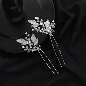Exquisite silver bridal hair pin featuring sparkling crystal beads and delicate pearl leaves.