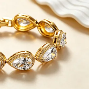 Gold plated pear cut cubic zirconia link bracelet close up detail shot for women jewelry