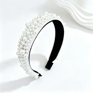 Elegant white faux pearl headband for women, bridal hair accessory for wedding party.