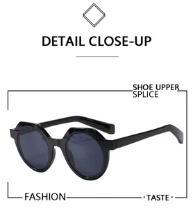 Lunettes de soleil polygonales noires élégantes pour femmes, tendance street style look.