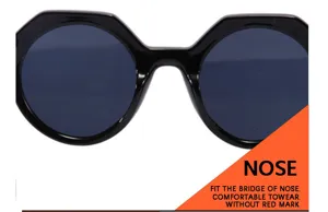 Lunettes de soleil polygonales tendance pour femmes, monture noire élégante et verres foncés.