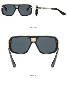Gafas de sol vintage oversize para hombre con montura negra y detalles metálicos dorados.