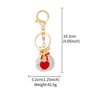 Metal rhinestone money bag keychain, red heart pendant, luxury car key ring, 10.3cm length.
