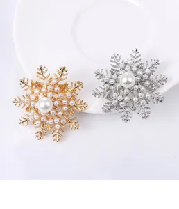 Exquisite snowflake pearl brooch featuring sparkling rhinestones, elegant detail shot.
