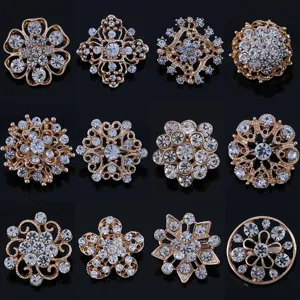 Set of 12 gold-tone alloy rhinestone brooches, elegant sparkling crystal flower pins for apparel.