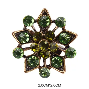 Exquisite vintage alloy green rhinestone brooch pin, delicate floral detail design.