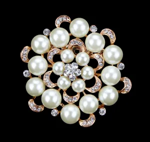 Round pearl rhinestone brooch detail shot, elegant gold plated vintage fashion accessory for women.