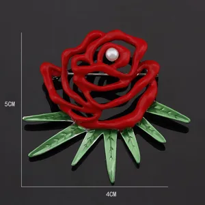 Red rose enamel brooch with pearl center, elegant floral pin apparel accessory for women.