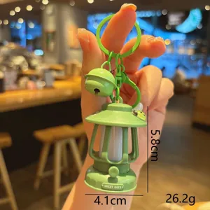 Mini camping lantern keychain cute glowing bag pendant portable key ring accessory gift.