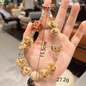 Colgante de teléfono con cuentas de leopardo bonito pompón esponjoso llavero bolso