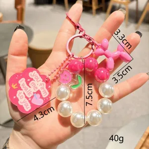 Schöner rosa Acryl Perlen Schlüsselanhänger mit Ballonhund und Perlen für Taschen.