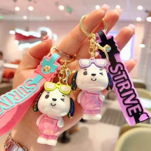 Cartoon electroplated puppy keychain cute dog bag pendant with silicone strap and metal ring.