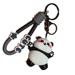 Cute cartoon panda keychain with silicone strap and metal ring, perfect bag pendant accessory.