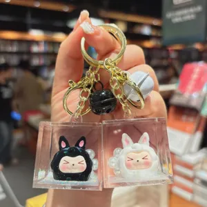 Portachiavi in acrilico con figurine di cartoni animati galleggianti per ciondolo borsa.