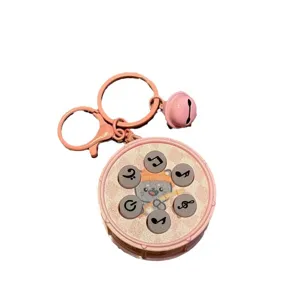 Portachiavi con tamburo musicale elettronico carino con campanello, ciondolo gatto rosa.