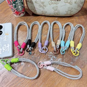 Dettagli del cinturino da polso per telefono in strass, cordino di cristallo per cover.