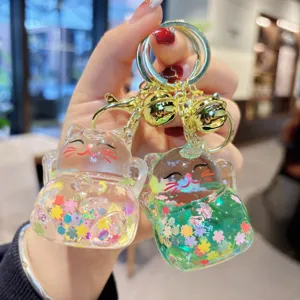 Cute liquid quicksand lucky cat keychain, acrylic glitter sparkling bag charm pendant.