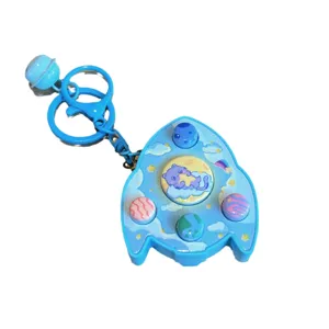 Kinder Rakete elektronische Spielkonsole Spielzeug, blaue Cartoon Tasche Anhänger mit Licht Ton.