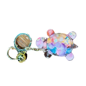 Simpatico portachiavi tartaruga liquida galleggiante, ciondolo borsa in resina glitterata.