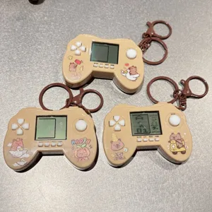 Cute capybara handheld game console keychain, mini portable decompression toy and bag pendant.