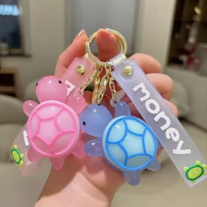 Llavero de tortuga de dibujos animados lindo, colgante de doble tortuga PVC con correa.