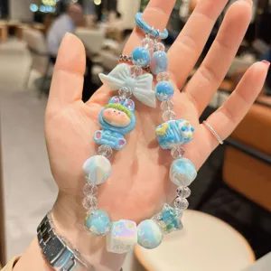 Cute blue cartoon doll beaded phone charm strap and keychain accessory detail view