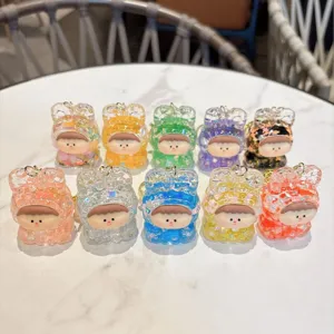 Cute acrylic quicksand keychain, glitter dynamic pendant, stylish toy bag charm accessory.