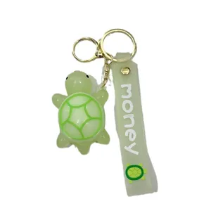 Llavero de tortuga verde luminoso con correa de silicona y anillo para decoración de bolsos
