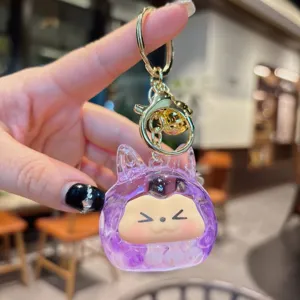 Simpatico portachiavi sabbia mobile viola con ciondolo mostro, perfetta decorazione borsa.