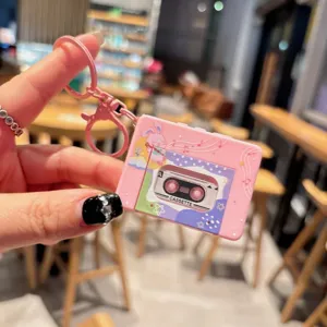 Cute pink cartoon cassette music keychain, lovely bag pendant and car key ring accessory.