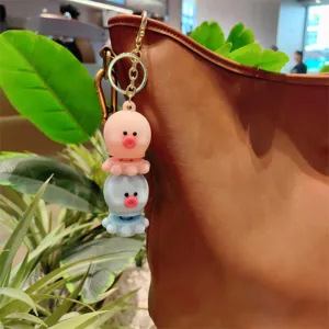 Cute stackable rotating octopus keychain detail, decompression pinch toy pendant for bags.