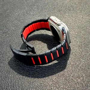 Replacement metal link watch band for Apple Watch, black and red dual color stainless steel strap.