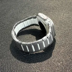 Stainless steel metal watch band compatible with Apple Watch, two-tone design for men.
