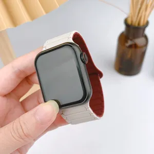Close-up detail of white and red silicone magnetic watch strap compatible with smartdevice.