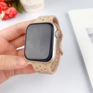 Bracelet de montre en silicone avec taches colorées et trous respirants, lanière de rechange.