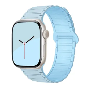 Silicone magnetic watch strap compatible with Apple Watch, light blue replacement band.