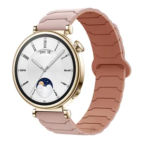 Pink silicone magnetic watch strap with gold case detail for smartwatches, sleek design.