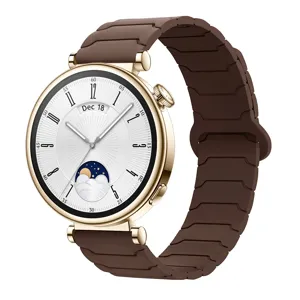 Gold case smartwatch with brown silicone magnetic strap featuring date and moon phase display.