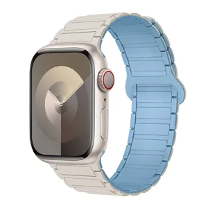 Silicone magnetic watch band compatible with smartwatches, stylish dual color replacement strap.